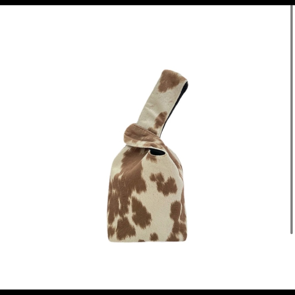 Carlton Yaito| Tan cow suede knot bag